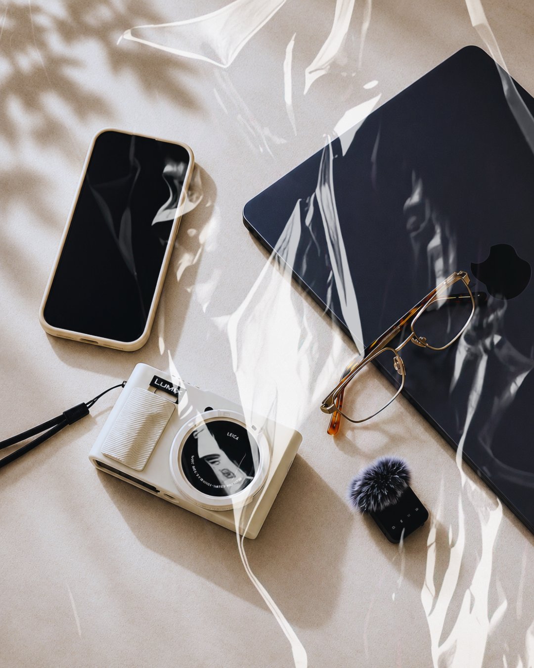 A creator's desk set up for filming and planning social content